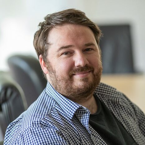Headshot of Christopher Armstrong, PhD