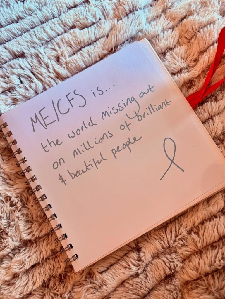 Sign from Angela that reads: “ME/CFS is the world missing our on millions of brilliant and beautiful people.