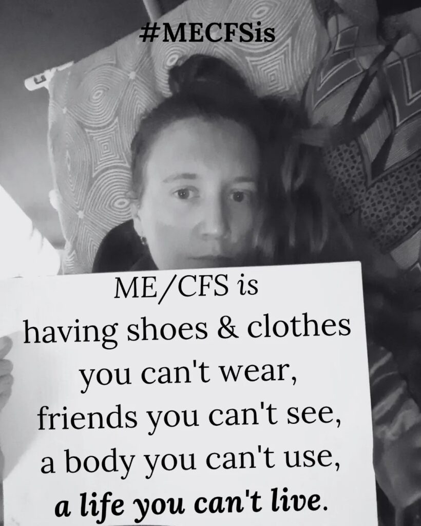 Sign that reads: ME/CFS is having shoes & clothes you can’t wear, friends you can’t see, a body you can’t use, a life you can’t live. lovenrageillustrations: Nafas is holding a sign that reads: ME/CFS is an invisible